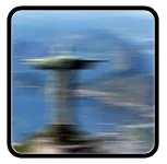 A blurry Christ the Redeemer, as if seen through a moving window